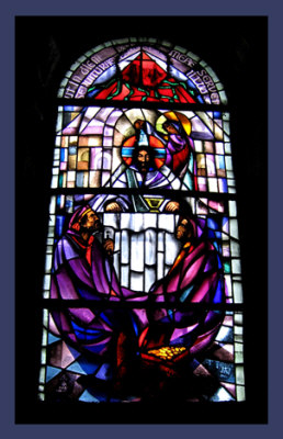 complete view of the stained glass depicting anointing of Jesus